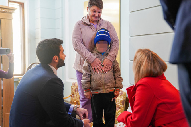 A 7-year-old Ukrainian boy, who is the first child released under a new mechanism Qatar has set up with the goal of repatriating children from Russia to Ukraine (Reuters)