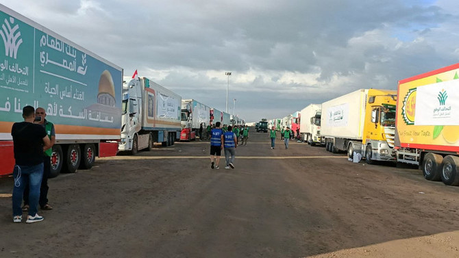 Trucks carrying humanitarian aid from Egyptian NGOs for Palestinians, wait for the reopening of the Rafah crossing at the Egyptian side, to enter Gaza, amid the ongoing conflict between Israel and Hamas, in Rafah, Egypt, Oct. 17, 2023. (Reuters)