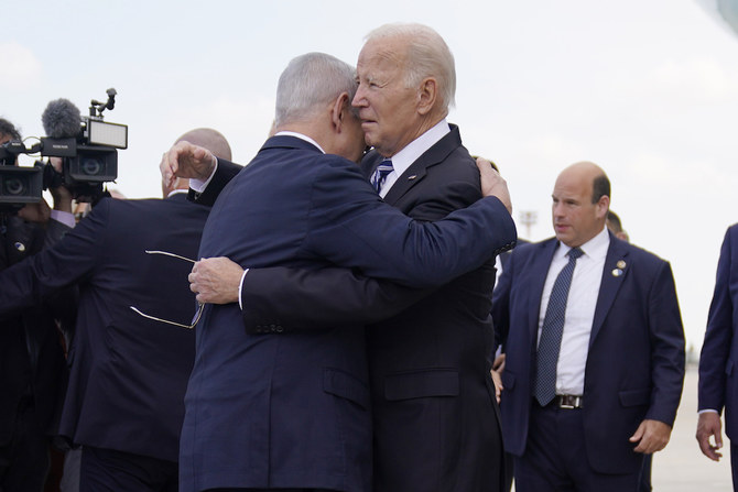 US President Joe Biden is greeted by Israeli Prime Minister Benjamin Netanyahu after arriving at Ben Gurion International Airport on Oct. 18, 2023 in Tel Aviv. (AP)