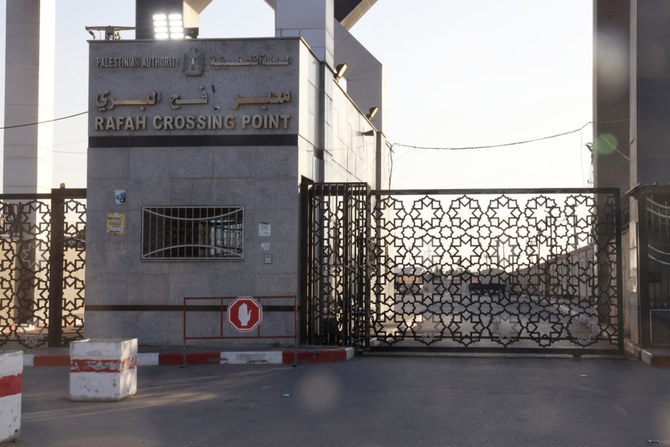 A picture taken on October 10, 2023, shows the closed gates of the Rafah border crossing with Egypt. (AFP)