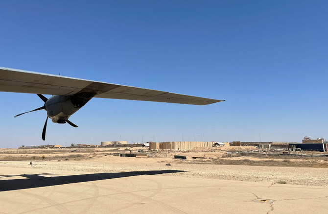 This picture taken on July 8, 2021 shows a C-130 Hercules turboprop military transport aircraft on the runway at Ain al-Assad air base, which hosts US forces in Iraq in the western Anbar province. Drones and rockets targeted the air base and multiple blasts were heard inside the base on Oct 19, 2023. (AFP/File photo)