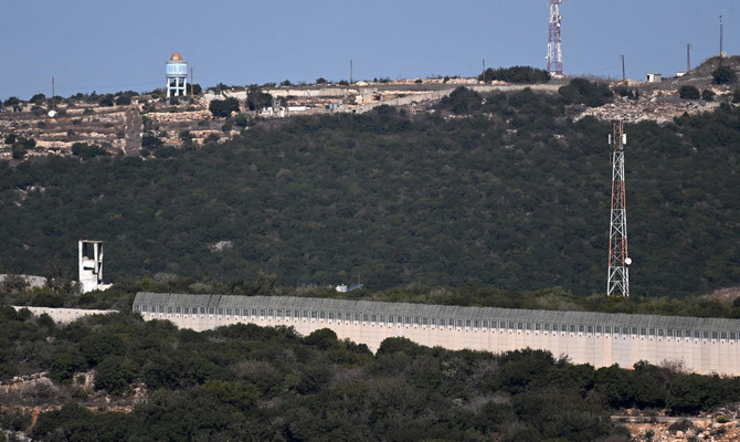 A picture taken during a media tour organized by the Israeli military, shows the border fence separating northern Israel from southern Lebanon on October 21, 2023. (AFP)