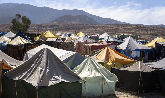 Tents house people who were displaced by the earthquake, in Amizmiz, outside Marrakech, Friday, Oct. 6, 2023. Hundreds of protesters on Oct. 24, took to the streets of a city near the epicenter of a devastating earthquake to express anger and frustration after weeks of waiting for emergency assistance. (AP)
