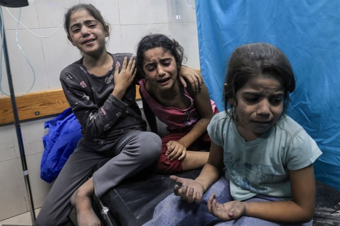 Palestinian children exposed to armed violence in Gaza are likely to suffer from attachment disorders, nightmares, and persistent anxiety as a result. (AFP)