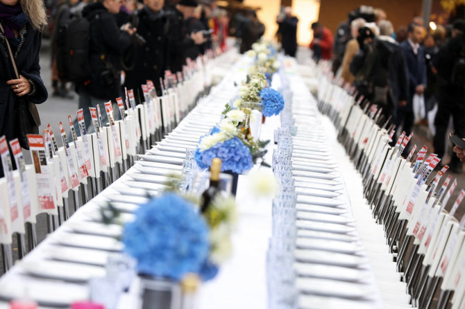 Berlin's Jewish community set up 220 chairs that symbolically represent hostages taken by Hamas and missing people waiting to come home, during a solidarity demonstration in front of the Jewish Parish Hall, in Germany on October 27, 2023. (REUTERS)