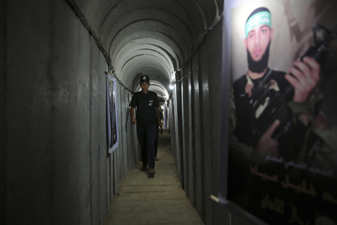 A Palestinian youth walks inside a tunnel used for military exercises during a weapon exhibition at a Hamas-run youth summer camp in Gaza City July 20, 2016. (AP/File)