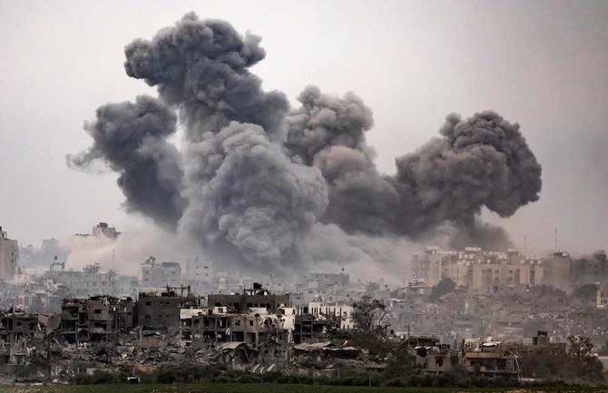 Black smoke ascends from the Gaza Strip amid heavy bombardment of the Israeli army on the Palestinian enclave. (AFP)
