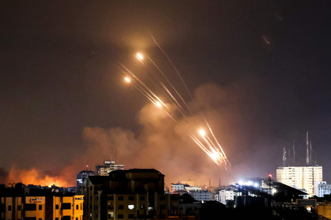 A salvo of rockets is fired by Palestinian militants from Gaza City toward Israel, on October 8, 2023. (AFP)