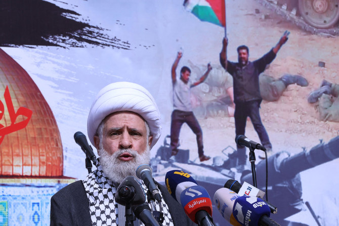 Hezbollah deputy chief Sheikh Naim Qassem speaks during a rally against Israel's war on Gaza in Beirut on Oct. 13, 2023. (AFP)