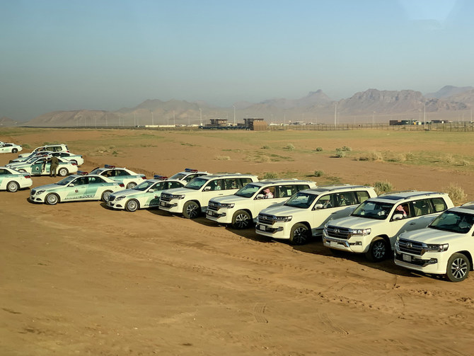 Dammam police arrested two citizens for attempting to distribute cannabis, amphetamines, shabu, and tablets subject to medical circulation regulations. Above, Saudi police vehicles in AlUla. (AFP file photo)