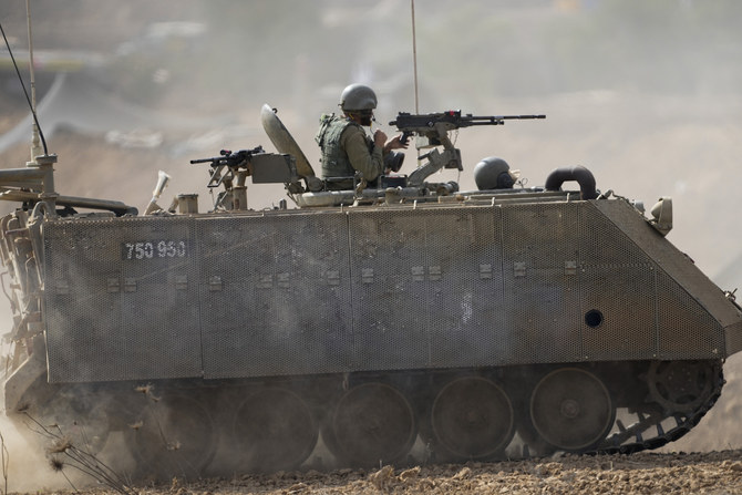 Israeli armored personnel carrier moves near the border with Gaza Strip on Tuesday, Oct. 31, 2023. (AP)