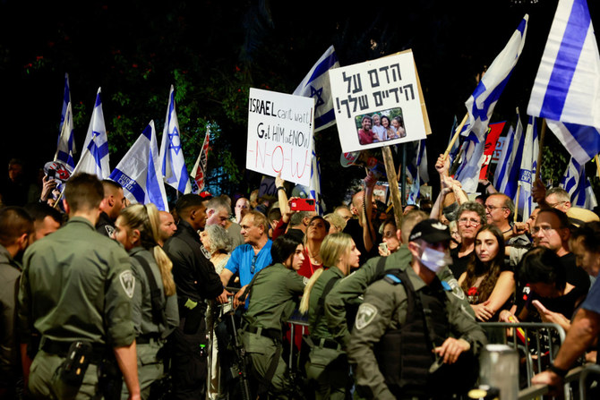 Protesters gather near Israeli Prime Minister Benjamin Netanyahu's residence in Jerusalem on Nov. 4, 2023, to call for his impeachment, amid war with Hamas. (Reuters)