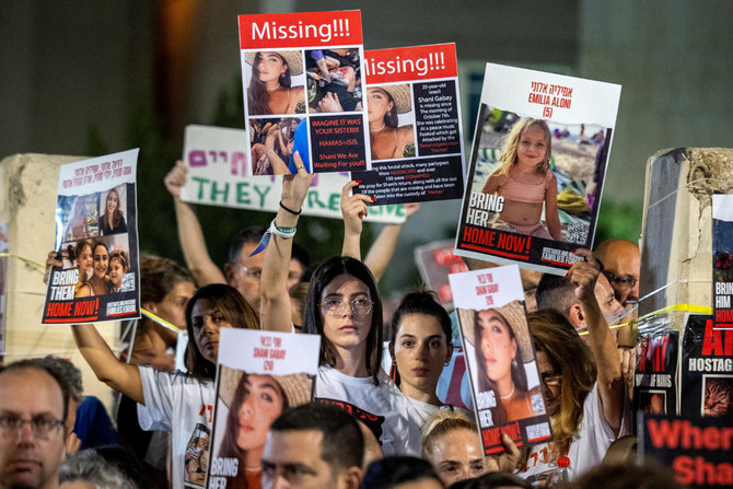 People rally in Tel Aviv, Israel, on November 4, 2023, to seek the immediate release of hostages hwho were seized in the October attack by Hamas gunmen. (Reuters)
