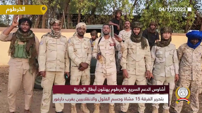In this still image from a video posted on social media by Sudan's RSF, fighters of the paramilitary group celebrate their supposed liberation of El Geneina in West Darfur state. (X: @RSFSudan)