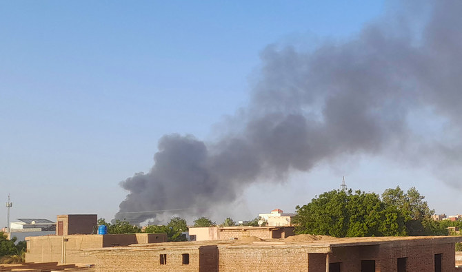 Smoke billows in the distance around the Khartoum Bahri district amid ongoing fighting on July 14, 2023. (AFP/File)