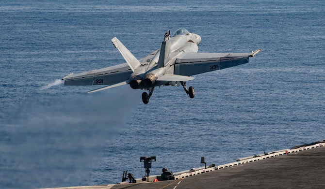 An F/A-18E Super Hornet attached to the 