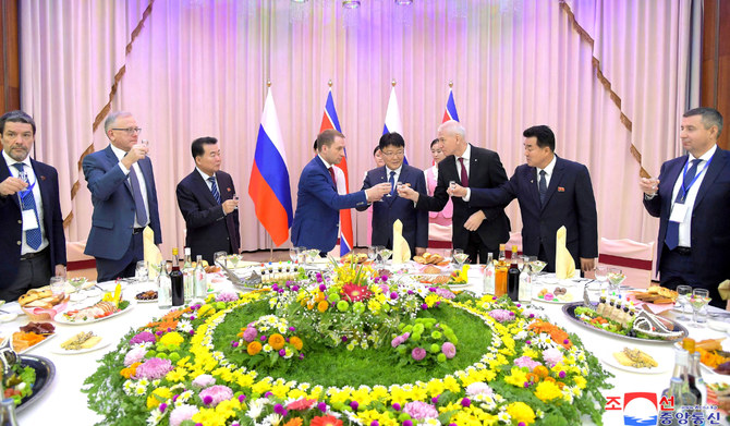 North Korean government representatives welcome a Russian delegation led by natural resources minister Alexander Kozlov during a banquet in Pyongyang, North Korea, November 14, 2023. (REUTERS)