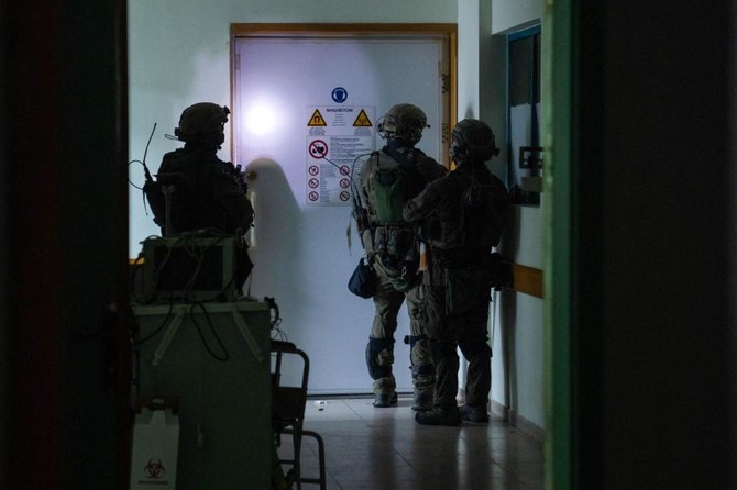 This handout picture released by the Israeli army on November 15, 2023, reportedly shows Israeli soldiers carrying out operations inside Al-Shifa hospital, amid continuing battles betweeen Israel and the Palestinian militant group Hamas. (File/AFP)