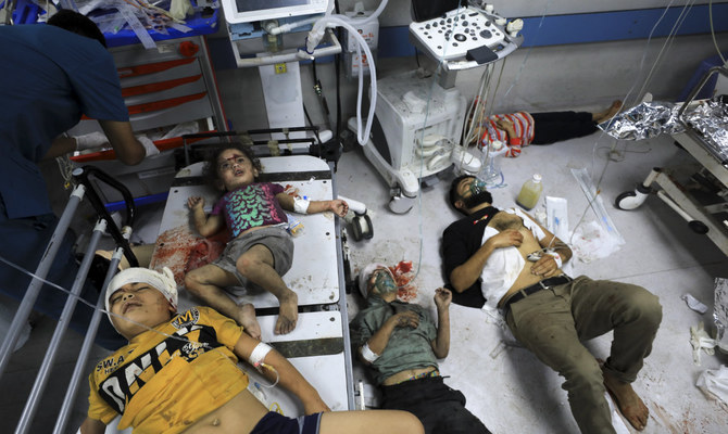 Palestinians wounded in the Israeli bombardment wait for treatment in Shifa Hospital in Gaza City, Monday, Oct. 23, 2023. As Palestinian authorities are proposing an evacuation of Gaza's biggest hospital, experts warn that transporting vulnerable babies and other patients is perilous even under the best circumstances. (AP)