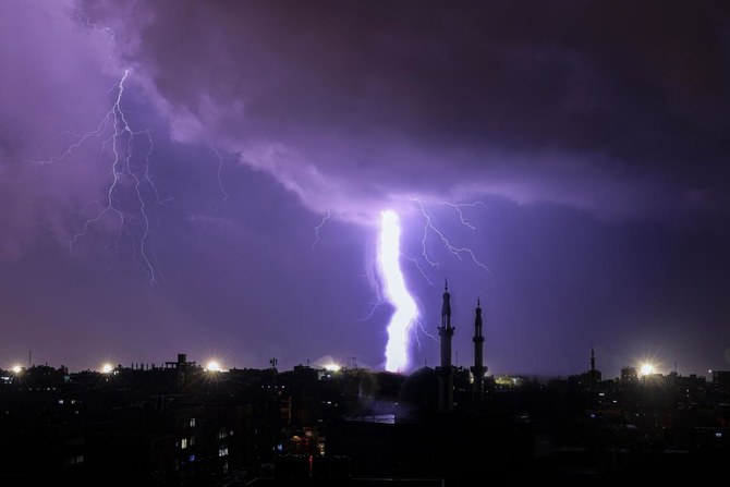 Lightening illuminates the sky during a storm over Rafah in the southern Gaza Strip on Nov. 14, 2023. (AFP)