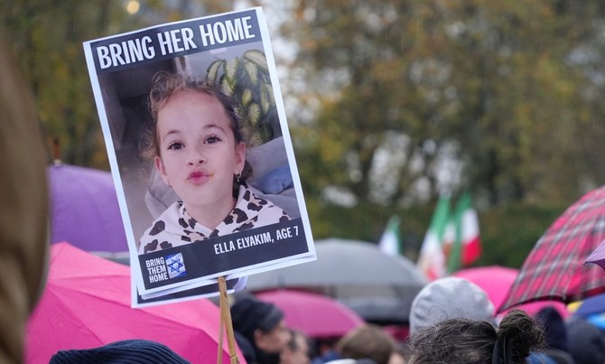A placard reads