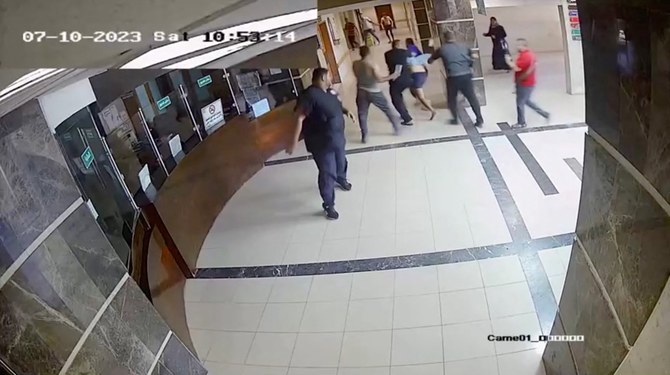 A screen grab of a video released by Israel of security camera footage of what they say is Hamas with hostages on Oct. 7, 2023, at Al-Shifa hospital, Gaza Strip. (Israel Defense Forces/Reuters)