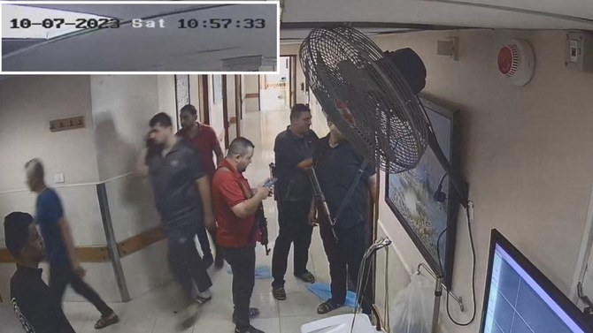 A screen grab of a video released by Israel of security camera footage of what they say is Hamas with hostages on Oct. 7, 2023, at Al-Shifa hospital, Gaza Strip. (Israel Defense Forces/Reuters)