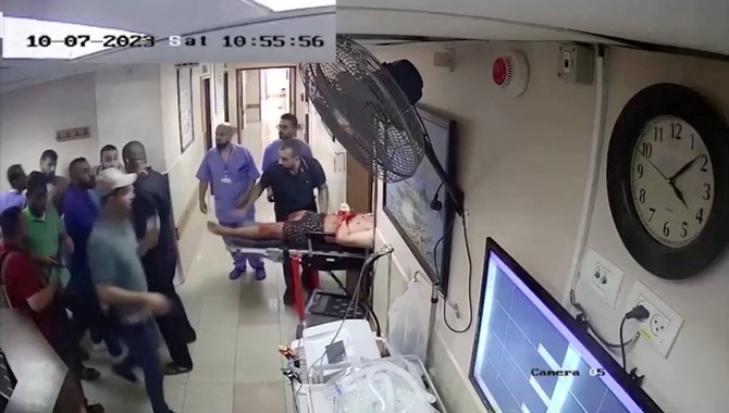 A screen grab of a video released by Israel of security camera footage of what they say is Hamas with hostages on Oct. 7, 2023, at Al-Shifa hospital, Gaza Strip. (Israel Defense Forces/Reuters)