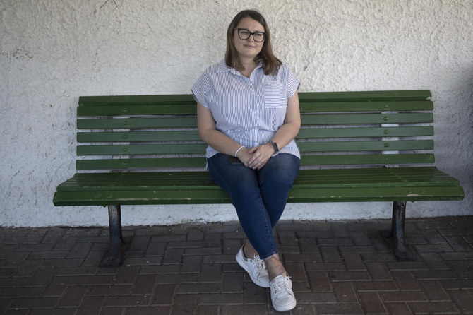 Tatyana Prima, who fled Mariupol, Ukraine, poses for a portrait outside of the apartment where she lives in Ashkelon, southern Israel, on Nov. 8, 2023. (AP)
