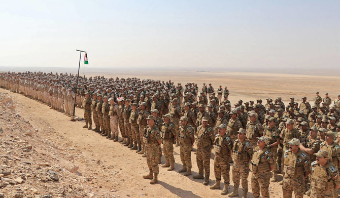 A handout picture released by the Jordanian Armed Forces shows soldiers standing guard during the Eager Lion multi-national military exercise at an undisclosed location in Jordan on September 4, 2022. (AFP)