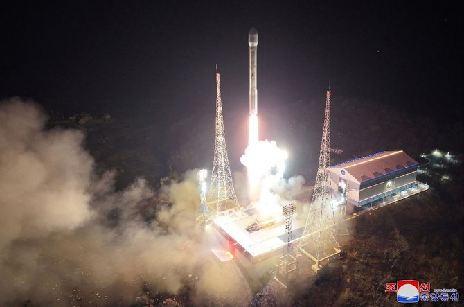 A rocket carrying the reconnaissance satellite ‘Malligyong-1’ launches from the Sohae Satellite Launch Site in North Phyongan province in North Korea. It is Pyongyang’s third attempt this year to put a satellite into orbit. (KCNA via KNS/AFP)