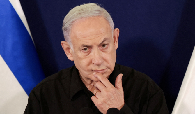 Ehud Olmert told Sky News that Netanyahu and his administration were a “real danger” to Israel’s stability and he should be “thrown out” of office. (Reuters)