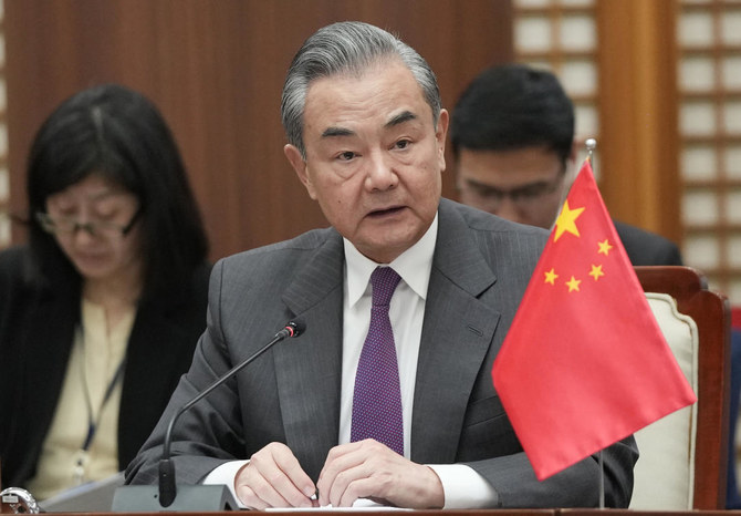 Chinese Foreign Minister Wang Yi speaks in Busan, South Korea, Sunday, Nov. 26, 2023. (AP)