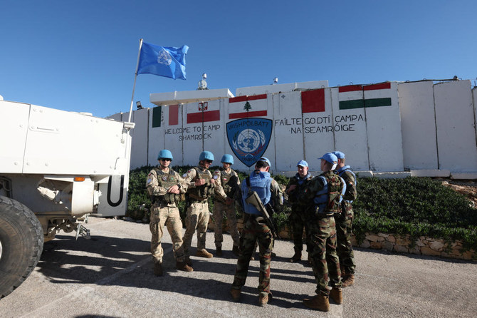 UN peacekeepers stand together during Reuters' visit at Camp Shamrock where Irish and Polish peacekeepers of the UNIFIL are stationed near Maroun al-Ras village close to the Lebanese-Israeli border, in southern Lebanon on Nov. 29, 2023. (Reuters)