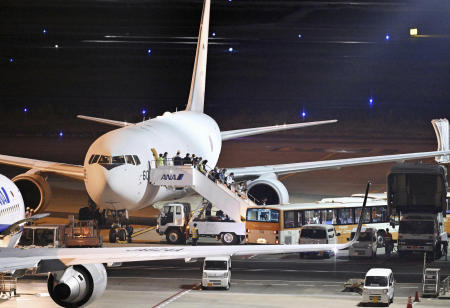 People evacuated from Israel get off the Japan Air Self-Defense Force's airplane as it arrived at the Haneda international airport in Tokyo, Friday, Nov. 3, 2023. (AP)