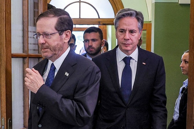 US Secretary of State Antony Blinken (C) meets with Israeli President Isaac Herzog (L) at the Ben-Gurion House on the Kirya military base in Tel Aviv on November 3, 3023 during his visit to Israel amid the ongoing conflict between Israel and the Palestinian Islamist group Hamas. (AFP)