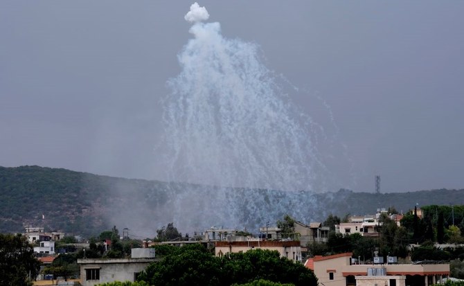 A white phosphorus shell, fired from Israel, explodes over Aita Al-Shaab, south Lebanon, Oct. 15, 2023. (AP Photo)