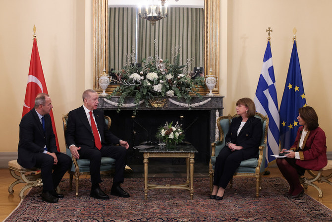 Greek President Katerina Sakellaropoulou, second right, meets with Turkish President Tayyip Erdogan, second left, at the Presidential Palace in Athens on Dec. 7, 2023. (Reuters)