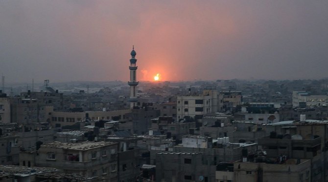 An explosion in Khan Yunis, as seen from Rafah, amid continuing battles between Israel and Hamas, Dec. 5, 2023. (AFP)