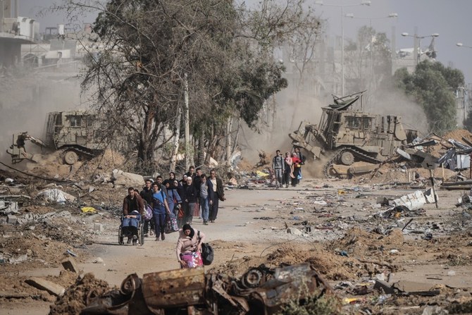 Palestinians head to the southern part of the Gaza Strip, fleeing the fighting between Israel and Hamas. (AP)