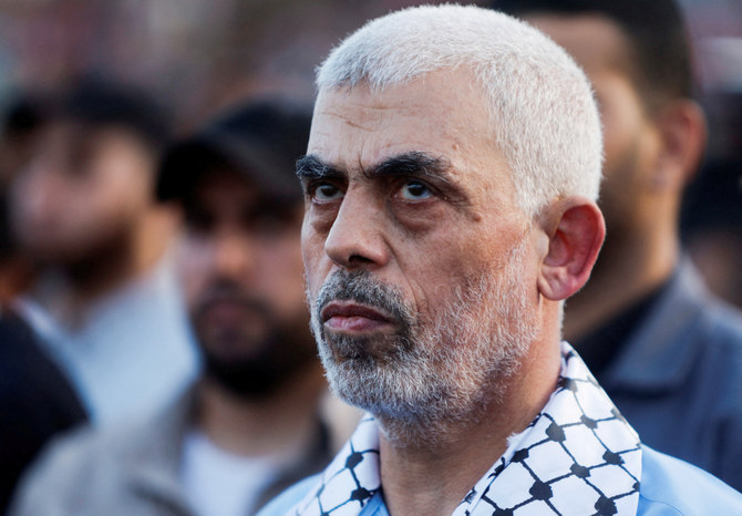 Hamas leader Yehya Al-Sinwar looks on as palestinians Hamas supporters take part in an anti-Israel rally over tension in Jerusalem's Al-Aqsa mosque, in Gaza City October 1, 2022. (REUTERS)