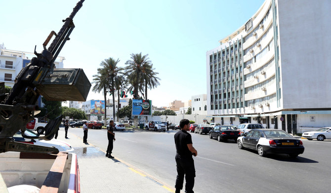 Security men guard the entrance to the Interior Ministry in the Libyan capital, Tripoli, on August 30, 2012. (AFP)