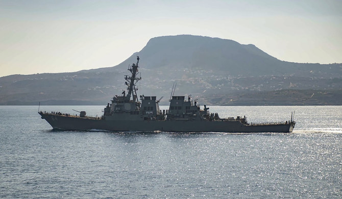 The guided-missile destroyer USS Carney in Souda Bay, Greece. The American warship and multiple commercial ships came under attack Sunday, Dec. 3, 2023 in the Red Sea, the Pentagon said, potentially marking a major escalation in a series of maritime attacks in the Mideast linked to the Israel-Hamas war. (AP)