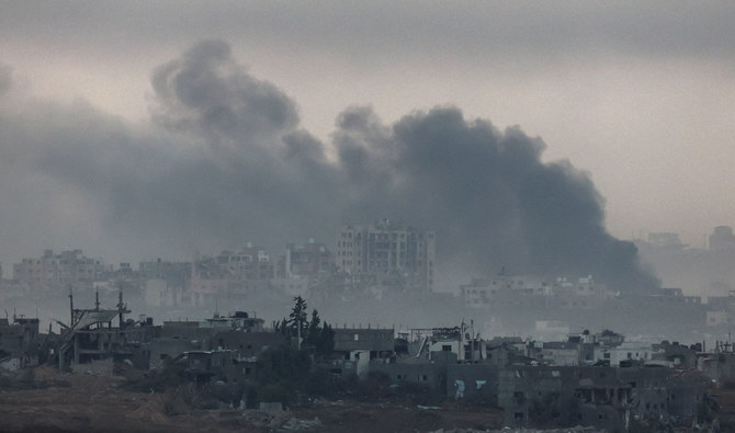 A picture taken from southern Israel near the border with the Gaza Strip on December 4, 2023, shows smoke billowing during Israeli bombardment in Gaza. (AFP/File)