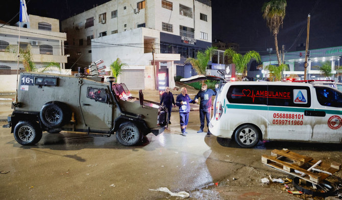 An ambulance is stopped by Israeli army forces during a raid in Jenin, in the Israeli-occupied West Bank December 5, 2023. (REUTERS)