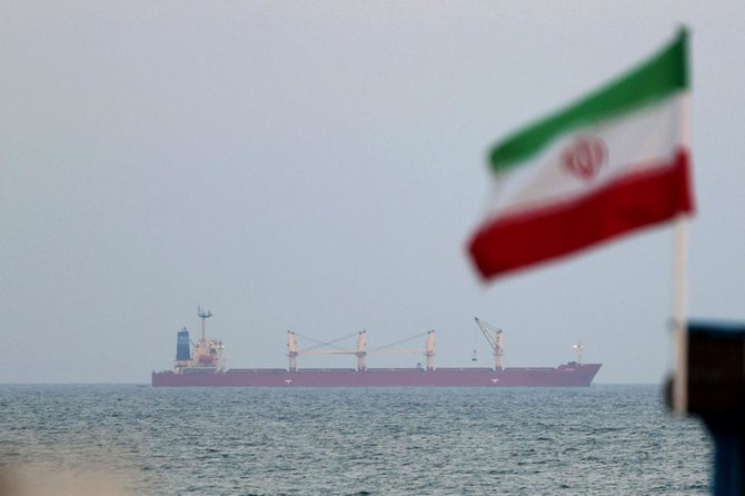 A picture taken on April 29, 2023, shows a shipping vessel sailing past Iran's Gulf island of Qeshm. (AFP)