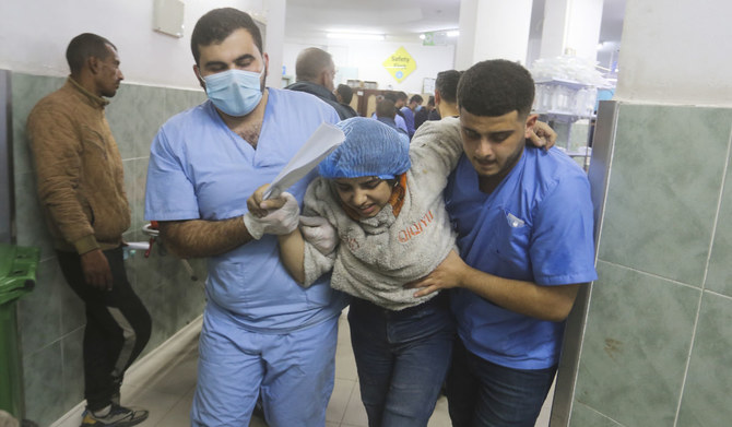 Palestinians wounded in the Israeli bombardment of the Gaza Strip arrive at a hospital in Rafah, on Wednesday, Dec. 6, 2023. (AP)