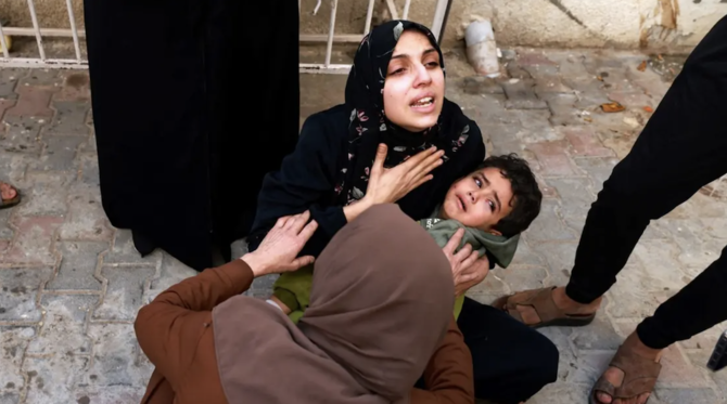International relief agencies said public order was disintegrating in Gaza as hunger spread, fueling fears of a mass exodus to Egypt. (AFP)
