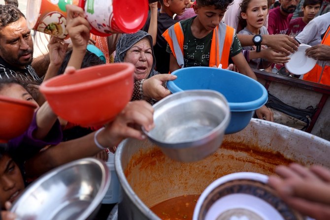 NGOs say none of Gaza’s 2.3 million inhabitants can find sufficient food and clean water under Israel’s renewed assault. (AFP)