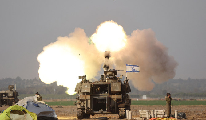 Israeli forces shell the Gaza Strip from the border area in southern Israel on December 12, 2023 amid ongoing battles with the Palestinian Hamas movement. (AFP)
